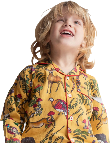 kid with jungle print wear